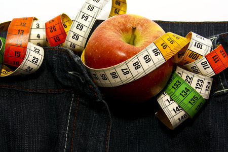 Jeans with apple and tape measure