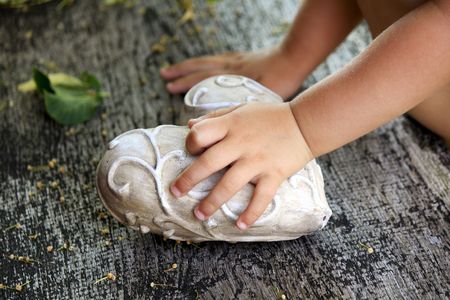 Child`s hand with a heartの写真素材