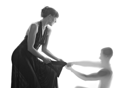 Young girl fighting with a man ghost の写真素材