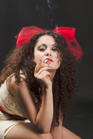 A woman smokesの写真素材