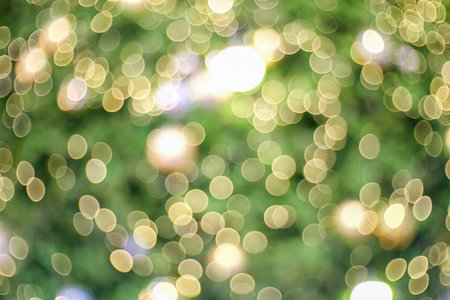 Yellow light and green bokeh nature background
