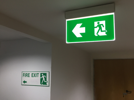 Emergency fire exit sign in offices.の写真素材