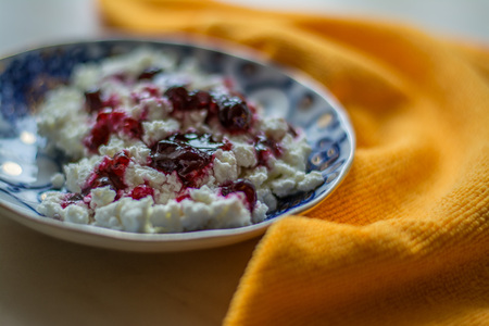 Cottage cheese  on wooden table, closeup food and drinkの写真素材