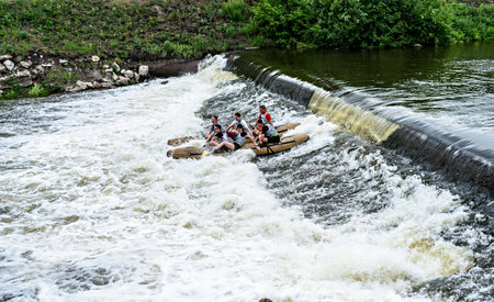 Yekaterinburg, Russia - 05.30.2021 team competitions on sports catamarans rafting on water, overcoming river rapids, extreme water sports, active lifestyleのeditorial素材