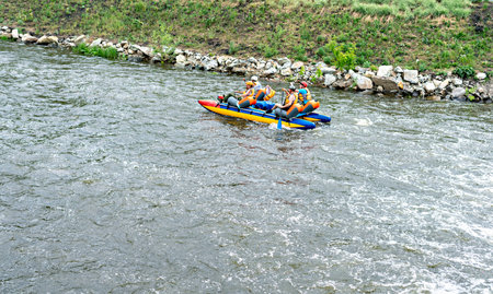 Yekaterinburg, Russia - 05.30.2021 team competitions on sports catamarans rafting on water,...