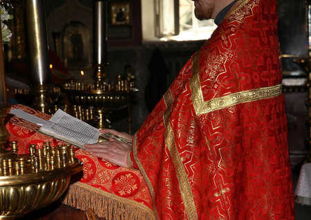 priest says a prayer on wedding