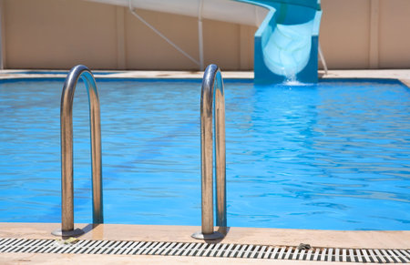 Pool and waterslide in the open air.