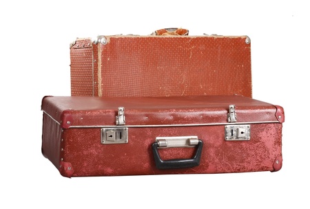 Two old suitcases. It is isolated on a white backgroundの写真素材