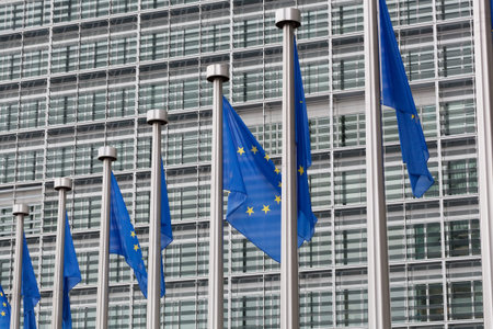 European Union flags in front of the Berlaymont building in Brussels, Belgium 