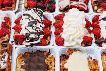 Belgian wafers with fresh strawberry and whipped creamの写真素材