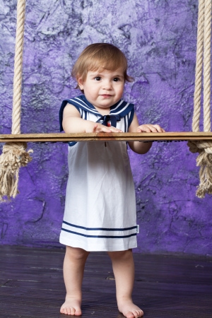 little girl in a dress in sailorの写真素材