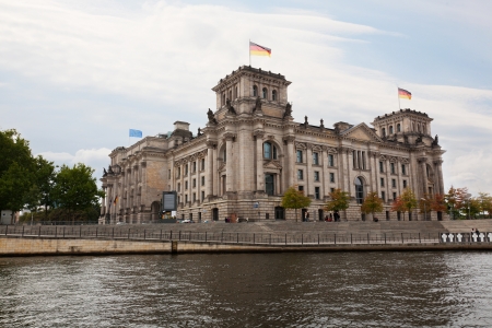 View of the Reichstag from the river Spree in cloudy weatherのeditorial素材