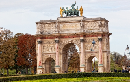 PARIS-OCT 02:Triumphal Arch (Arc de Triomphe du Carrousel) at Tuileries gardens in Paris,France on October 02,2012. The monument was built between 1806-1808 to commemorate Napoleon's military victories のeditorial素材