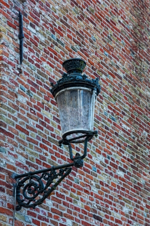 Decorative lamp on a brick wallの写真素材