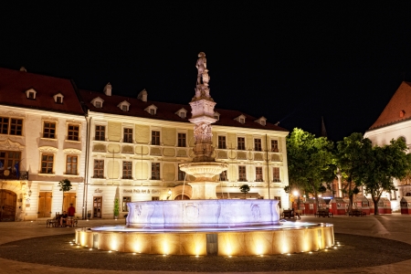 BRATISLAVA, SLOVAKIA - JULY 23: The fountain with illumination on a central square at night in Bratislava, Slovakia, July 23, 2013. Bratislava is the most populous (462,000) and most visited city in Slovakia.のeditorial素材