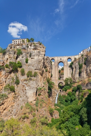 new bridge and houses on the edge of an abyss in the city Rhonda, Spainの写真素材