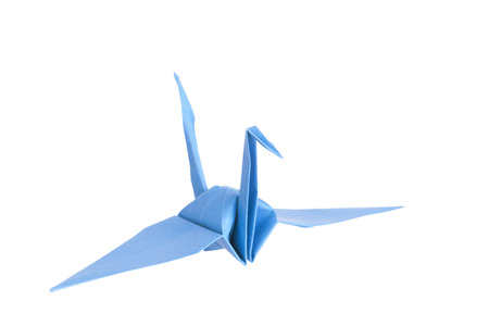 Origami. Figure a crane on a white . Isolated.の写真素材