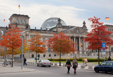 BERLIN, GERMANY - SEPT 23:Tourists near Reichstag, September 23,2012, Berlin, Germany. After moving of Bundestag to Berlin in 1999 building of Reichstag was visited by over 13 mil. from all over world のeditorial素材
