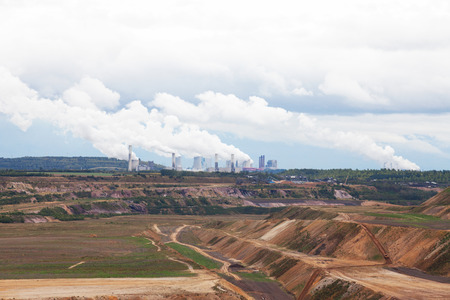 Thermal power plant against an open coal pitの写真素材