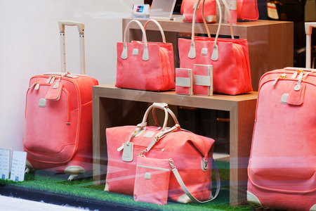 ITALY, MILAN - MAY 07, 2014: Magnificent women's bags in a shop show-window. The city of Milan is the recognized capital of the European fashion.のeditorial素材
