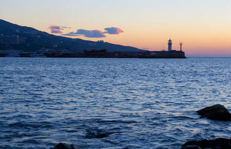 Beacon in Yalta at sunrise, a view from the central city embankment, the Crimeaの写真素材