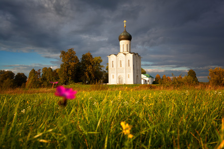 Reserved meadow near Church of the Intercession of the Holy Virgin on the Nerl River before a rainの写真素材