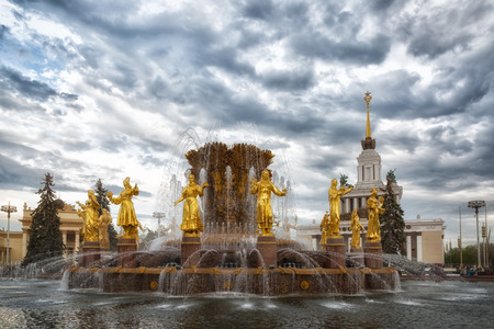 fountain Friendship of the people and the Central pavilion on VVC (VDNH) in Moscow, Russiaの写真素材