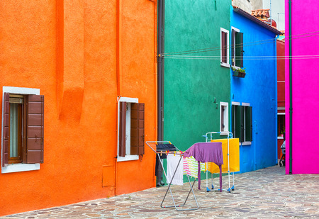 Burano, colorful houses and the laundry on the dryerの写真素材