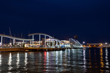 BARCELONA , SPAIN - SEPTEMBER, 28, 2013. Marina Port Vell and the Rambla del Mar in Barcelona . The Ramla del Mar is a main attraction in Barcelona.のeditorial素材