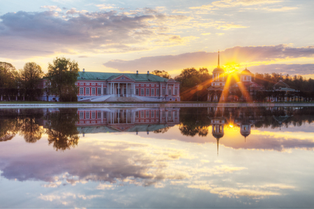 Farmstead Count Sheremetev Kuskovo at sunrise with reflection in a pond, Moscowの写真素材