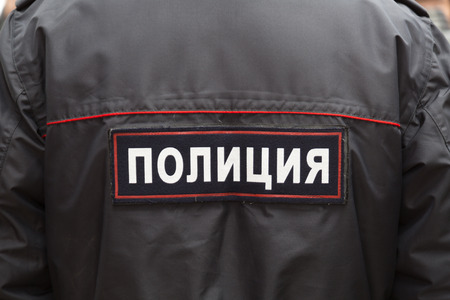 RUSSIA - APRIL 23, 2015 - The inscription Police on the form of the Russian police.のeditorial素材