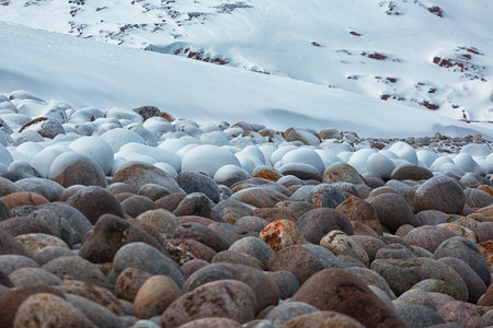Winter landscape with snow-covered rocksの写真素材