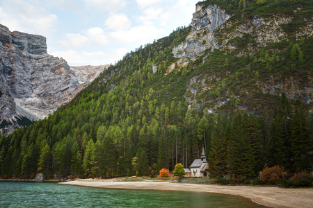 Shapel Marienkapelle at the Braies Lake (Pragser Wildsee) in Dolomites mountains, Sudtirol, Italyの写真素材
