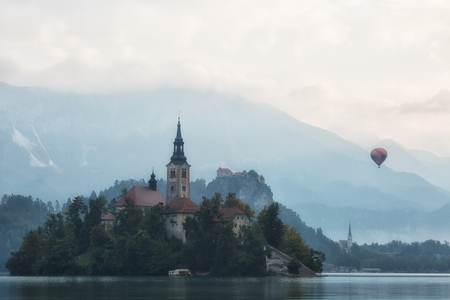 Church on island in Lake Bled at sunrise, Sloveniaの写真素材