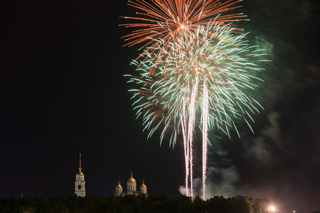 Big festive fireworks over the Assumption Cathedral in Vladimir, Russiaの写真素材