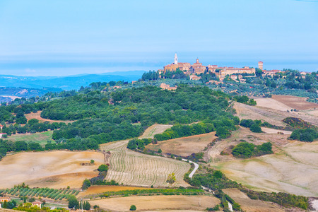 Beautiful view of the Pienza and vineyards on a sunny autumn day, Tuscany, Italyの写真素材