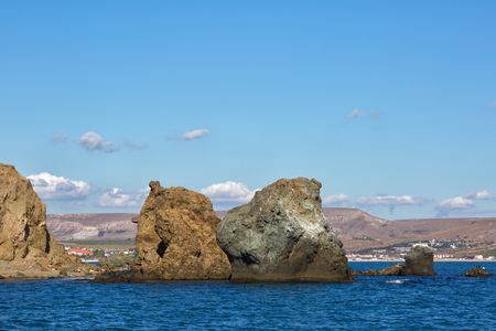 Small rocks in the water at the foot of Karadag, Crimeaの写真素材