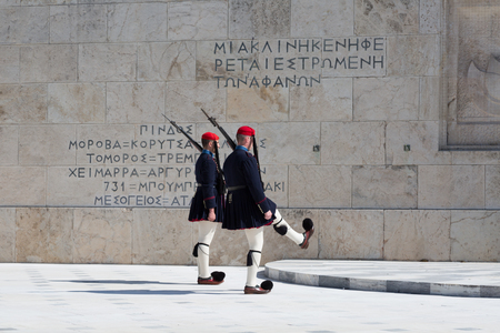 ATHENS, GREECE - FEBRUARY 24 2017: Evzones - presidential ceremonial guards in the Tomb of the Unknown Soldier at the Greek Parliamen, Athens, Greeceのeditorial素材