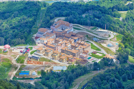 SOCHI, RUSSIA - JUNE 11, 2016: Modern fashionable hotels and apartments of Gorky Gorod winter ski resort's accommodation infrastructureのeditorial素材