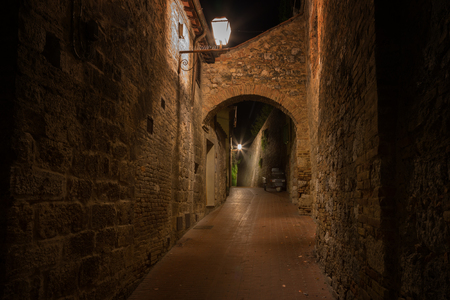 Medieval streets of San Gimignano at night, Tuscany, Italyのeditorial素材