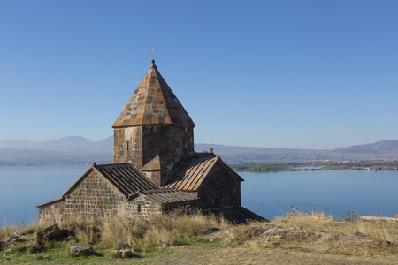 Scenic view of an old Sevanavank church in Sevan, Armenia on sunny  day, blue skyの写真素材