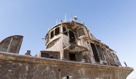 Old rusty ship on sky backgroundの写真素材