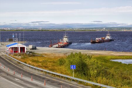 RUSSIA, SALEHARD - AUGUST 08, 2018: Ferry crossing the Ob River from Salekhard to Labytnangiのeditorial素材