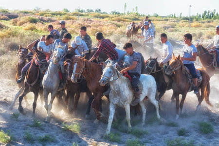 UZBEKISTAN, KARAKALPAKSTAN - SEPTEMBER 21, 2019: Traditional equestrian game of the peoples of Asia...