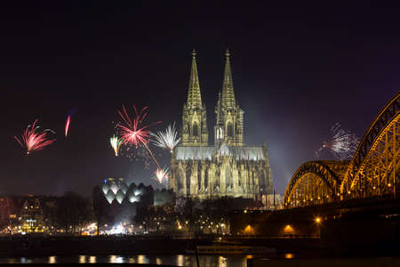 New Year's Eve fireworks display near the cathedral in Cologne, Germanyの写真素材