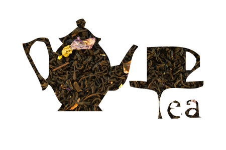 Black tea flavored with lemon peel and cornflower laid out in the form of a teapot and cupsの写真素材