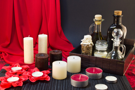 Still life of candle, tools for massage creams for skin care and bath salt.の写真素材