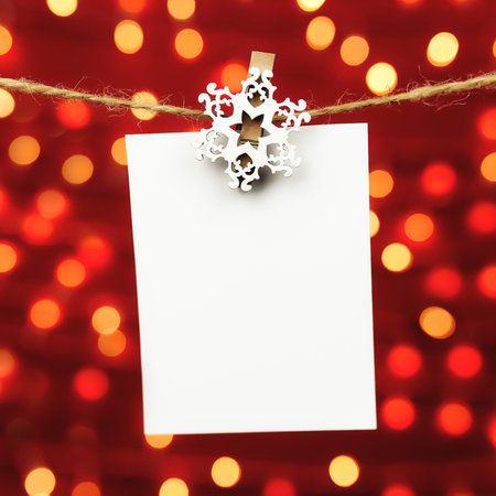 Christmas greeting card on christmas lights backgroundの写真素材