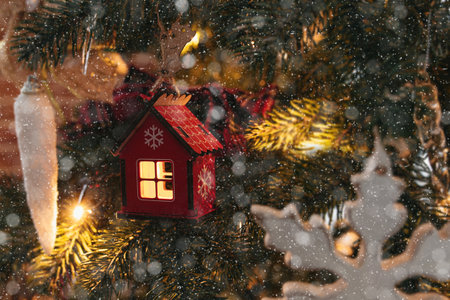 Toy house on Christmas tree, Christmas at home, Christmas tree toysの写真素材