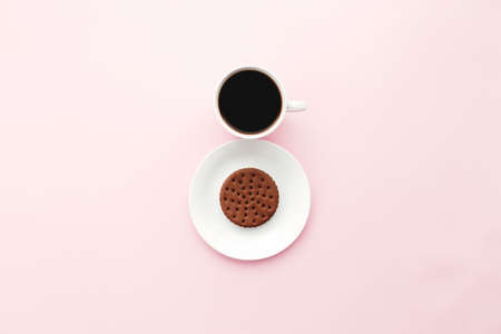 Woman international day concept, coffee cup, plate, cookie on pink background. High quality photoの写真素材